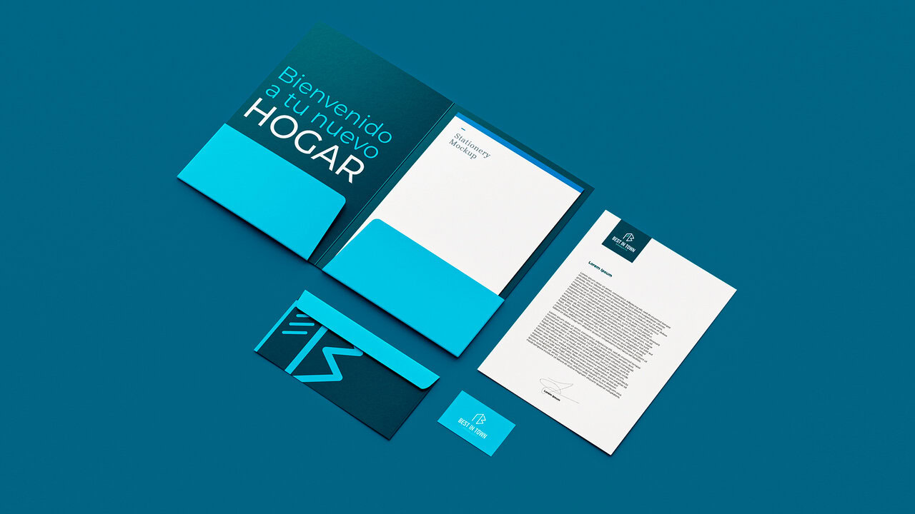 Papeleria corporativa que muestra un diseño elegante y moderno para inmobiliaria en la ciudad de puebla.