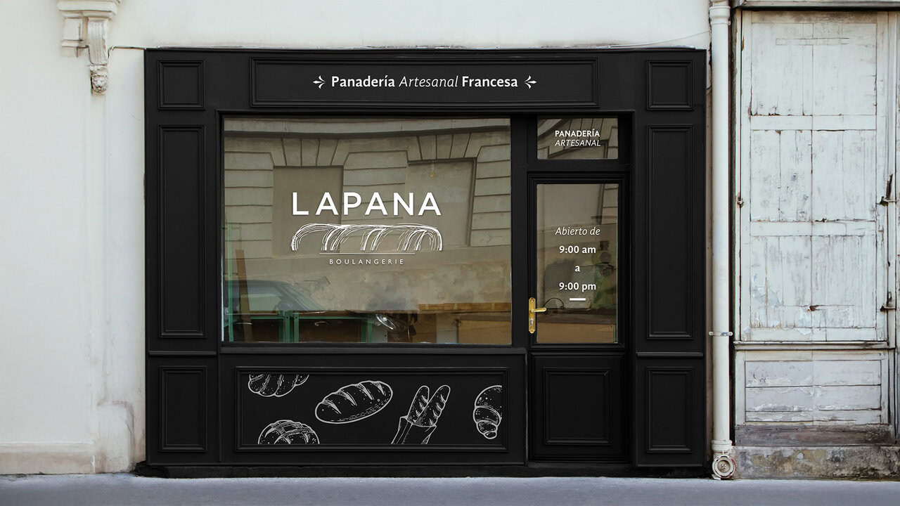 Fachada de la panadería LAPANA. Diseño en color negro con el logotipo en blanco y texto que indica 'Panadería Artesanal Francesa'. Diseño de exteriores para negocio.
